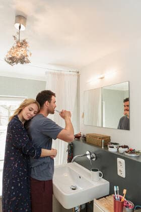 Couple in bathroom brushing teeth, 29.07.2016, Copyright: xLillyxBloomx, model released, brushing teeth,three quarter length,at home,connections,beauty,hygiene,oral hygiene,serene people,togetherness,affection,love,trust,mirror,30 to 34 years,35 to 39 years,european ethnicity,female,woman,mid adult woman,male,man,mid adult man,couple,heterosexual couple,two people,sink,indoors,bathroom,day,arm around,hugging,toothbrush,electric toothbrush,dental hygiene,mid adult couple,morning routine,both male and female,August 2016 Release,Brushing,Brushing Teeth,Mid Adult,35-39 Years,30-34 Years,Female,Women,Mid Adult Women,Male,Men,Mid Adult Men,Couple,Heterosexual Couple,Mid Adult Couple,Connection,Hygiene,Love,Mood,Calm,Serene People,Togetherness, Ref:IS09B084S