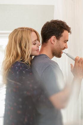 Couple in bathroom brushing teeth, 29.07.2016, Copyright: xLillyxBloomx, model released, brushing teeth,blond hair,focus on background,waist up,at home,connections,beauty,hygiene,oral hygiene,serene people,togetherness,affection,happiness,trust,30 to 34 years,35 to 39 years,european ethnicity,female,woman,mid adult woman,male,man,mid adult man,couple,heterosexual couple,two people,indoors,bathroom,day,arm around,hugging,long hair,toothbrush,electric toothbrush,dental hygiene,mid adult couple,morning routine,blur,both male and female,Star Images,August 2016 Release,Brushing,Brushing Teeth,Mid Adult,35-39 Years,30-34 Years,Female,Women,Mid Adult Women,Male,Men,Mid Adult Men,Couple,Heterosexual Couple,Mid Adult Couple,Connection,Hygiene,Moo Ref:IS09B084T