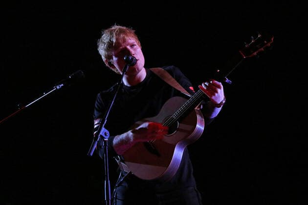 Ed Sheeran performs during the Global Citizen Live concert in Paris on Saturday, September 25, 2021. The concert, held at the base of the Eiffel Tower, is one of several taking place in cities around the world including New York, Los Angeles, London, Sydney, Lagos, Rio, Mumbai and Seoul. The event aims to raise awareness for issues related to the climate and ending poverty. PARI20210925053 DAVIDxSILPA