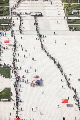 (211021) -- LANZHOU, Oct. 21, 2021 -- Residents wait in line to get COVID-19 nucleic acid tests at a temporary testing site in Lanzhou, capital of northwest China s Gansu Province, Oct. 21, 2021. Lanzhou suspended in-person classes for local kindergartens, primary and high schools, and off-campus training institutions starting Thursday for COVID-19 control. Health authorities had collected 11,326 samples for nucleic acid testing from nine schools in Lanzhou, with all samples testing negative, said the information office of the provincial government. Gansu reported five locally transmitted confirmed COVID-19 cases on Wednesday, including four in Lanzhou, according to the National Health Commission. ) CHINA-GANSU-LANZHOU-COVID-19-SCHO