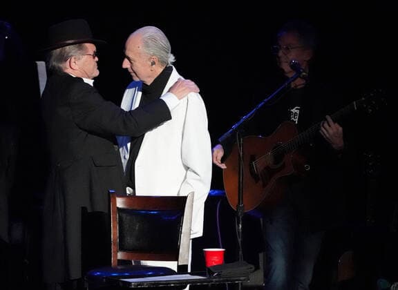November 15, 2021, Los Angeles, CA, USA: Musician-Actors-MICHAEL NESMITH and MICKY DOLENZ on stage together for the last time as they wrapped up the Monkees 2021 Farewell Tour at the Greek Theater, Los Angeles, CA, USA, November 14, 2021. his farewell tour will mark the end of a unique project that began in 1965 when four young men were cast in a television show about a struggling rock band that was inspired by the Beatlesâ€⠢ A Hard Dayâ€⠢s Night. Few could have predicted the impact The Monkees would have on music and pop culture at large, one that still reverberates more than 50 years later...Formed in Los Angeles for the eponymous television series, the quartet of Dolenz, Nesmith, the late Peter Tork and the late Davy Jones bro - ZUMAmt3_ 20211115_zaf_mt3_001 Copyright: xScottxMitchellx