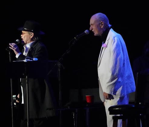 November 15, 2021, Los Angeles, CA, USA: Musician-Actors-MICHAEL NESMITH and MICKY DOLENZ on stage together for the last time as they wrapped up the Monkees 2021 Farewell Tour at the Greek Theater, Los Angeles, CA, USA, November 14, 2021. his farewell tour will mark the end of a unique project that began in 1965 when four young men were cast in a television show about a struggling rock band that was inspired by the Beatlesâ€⠢ A Hard Dayâ€⠢s Night. Few could have predicted the impact The Monkees would have on music and pop culture at large, one that still reverberates more than 50 years later...Formed in Los Angeles for the eponymous television series, the quartet of Dolenz, Nesmith, the late Peter Tork and the late Davy Jones bro - ZUMAmt3_ 20211115_zaf_mt3_004 Copyright: xScottxMitchellx