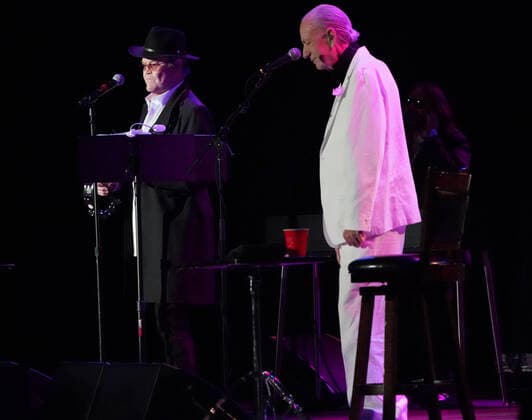 November 15, 2021, Los Angeles, CA, USA: Musician-Actors-MICHAEL NESMITH and MICKY DOLENZ on stage together for the last time as they wrapped up the Monkees 2021 Farewell Tour at the Greek Theater, Los Angeles, CA, USA, November 14, 2021. his farewell tour will mark the end of a unique project that began in 1965 when four young men were cast in a television show about a struggling rock band that was inspired by the Beatlesâ€⠢ A Hard Dayâ€⠢s Night. Few could have predicted the impact The Monkees would have on music and pop culture at large, one that still reverberates more than 50 years later...Formed in Los Angeles for the eponymous television series, the quartet of Dolenz, Nesmith, the late Peter Tork and the late Davy Jones bro - ZUMAmt3_ 20211115_zaf_mt3_009 Copyright: xScottxMitchellx