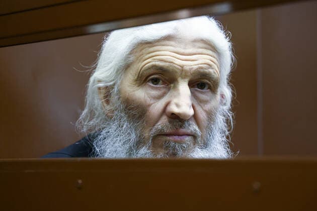 MOSCOW, RUSSIA - NOVEMBER 30, 2021: Unordained schema hegumen Sergius (Nikolai Romanov), charged with unsanctioned actions, encouraging people to kill themselves, and violating the right for freedom of religion, attends the verdict announcement at Moscow’s Izmailovsky District Court. Romanov was arrested at the Sredneuralsk Convent and sent to Moscow on December 29, 2020; he was excommunicated in May 2020 for violating a ban on preaching after calling on people to go to church despite the lockdown, describing the coronavirus situation as a fake pandemic . More recently, Sergius was stripped of his rank by the Yekaterinburg Eparchy court and ordered to leave the convent, but continued to perform church services nevertheless. The metropolita TS11A0DC