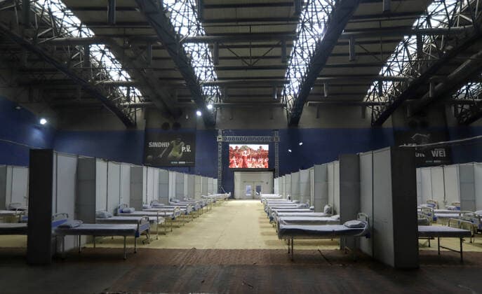Coronavirus, Eindrücke aus Indien January 4, 2022, New Delhi, New Delhi, INDIA: COVID-19 care center set up amid the spread of the coronavirus at Commonwealth Games (CWG) Village sports complex in New Delhi, India, 04 January 2022. Delhi reported 5,481 new cases of COVID-19. Delhi Disaster Management Authority (DDMA) on Tuesday decided to impose a weekend curfew in Delhi. India has reported 37,379 new Covid-19 cases, 124 deaths in 24 hours. New Delhi INDIA - ZUMAp176 20220104_zip_p176_013 Copyright: xVijayxPandeyx