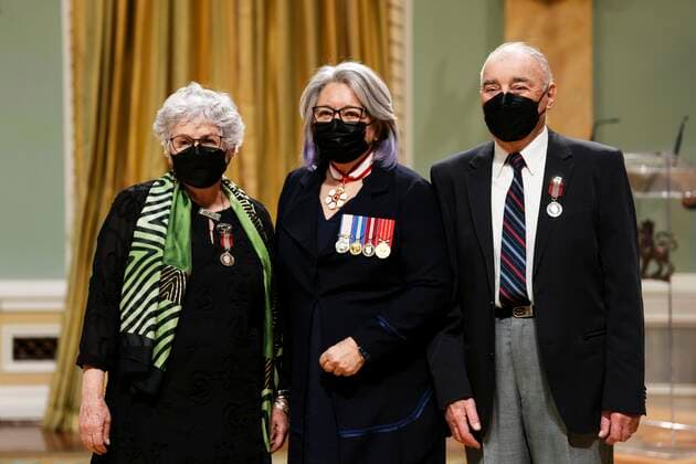 April 21, 2022, Ottawa, Ontario, Canada: Governor General Mary Simon presents the Sovereign s Medal for Volunteers to Simone Pietri, left, and Gerard Oudar, right, of Quebec, Que., during an in-person ceremony at Rideau Hall in Ottawa on Thursday, April 21, 2022. Ottawa Canada - ZUMAc35_ 20220421_zaf_c35_014 Copyright: xSeanxKilpatrickx