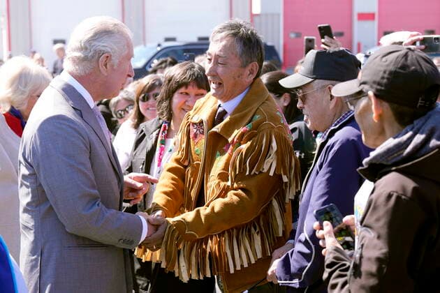 May 19, 2022, Yellowknife, NT, CANADA: Prince Charles, second from left, and Camilla, Duchess of Cornwall, obscured behind him, are welcomed after arriving in Yellowknife, Northwest Territories, during part of the Royal Tour of Canada, Thursday, May 19, 2022. Yellowknife CANADA - ZUMAc35_ 20220519_zaf_c35_069 Copyright: xPaulxChiassonx