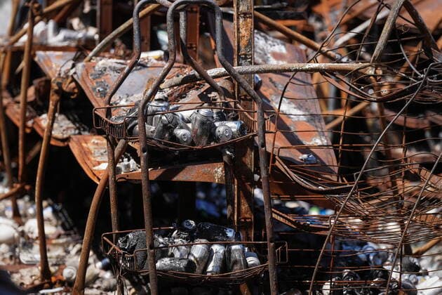 June 14, 2022, LYTTON, BC, CANADA: Beverage cans and shelving are seen inside a grocery and liquor store that was destroyed by wildfire, in Lytton, B.C., on Tuesday, June 14, 2022. The fire-ravaged community of Lytton, B.C., will get $77 million from the federal government to help it rebuild a fire-resistant and energy-efficient community. Two people were killed and much of the centre of the village was destroyed when wildfire ripped through the community almost a year ago. LYTTON CANADA - ZUMAc35_ 20220614_zaf_c35_090 Copyright: xDarrylxDyckx