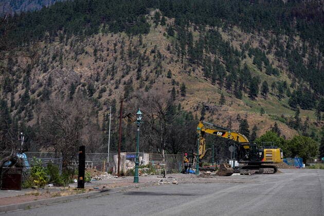 June 14, 2022, LYTTON, BC, CANADA: Heavy equipment is seen parked on a street in Lytton, B.C., on Tuesday, June 14, 2022. The fire-ravaged community of Lytton, B.C., will get $77 million from the federal government to help it rebuild a fire-resistant and energy-efficient community. Two people were killed and much of the centre of the village was destroyed when wildfire ripped through the community almost a year ago. LYTTON CANADA - ZUMAc35_ 20220614_zaf_c35_102 Copyright: xDarrylxDyckx