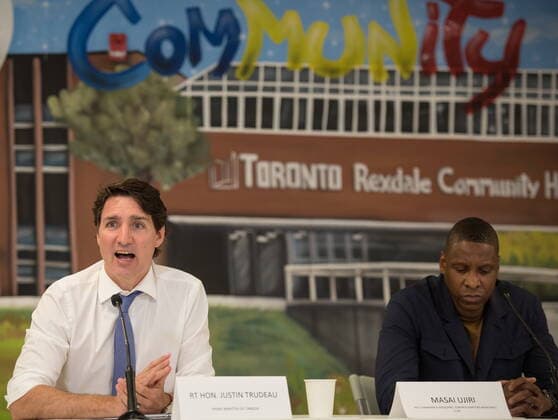 July 5, 2022, Etobicoke, ON, CANADA: Prime Minister Justin Trudeau, left, speaks as Toronto Raptors President Masai Ujiri listens during a gun violence roundtable at Rexdale Community Centre in Etobicoke, Ont., on Tuesday, July 5, 2022. Etobicoke CANADA - ZUMAc35_ 20220705_zaf_c35_002 Copyright: xTijanaxMartinx