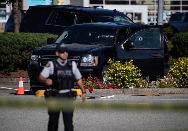 July 25, 2022, LANGLEY, BC, CANADA: Bullet holes are seen in the windshield and driveröÄÃ s side window of an RCMP vehicle at the scene of a shooting, in Langley, B.C., on Monday, July 25, 2022. A suspect is in custody after several people were shot in the Metro Vancouver city of Langley, RCMP said. Police issued a blaring cellphone alert at about 6:20 Monday morning, saying they were at the scenes of several shootings involving transient victims. LANGLEY CANADA - ZUMAc35_ 20220725_zaf_c35_105 Copyright: xDarrylxDyckx