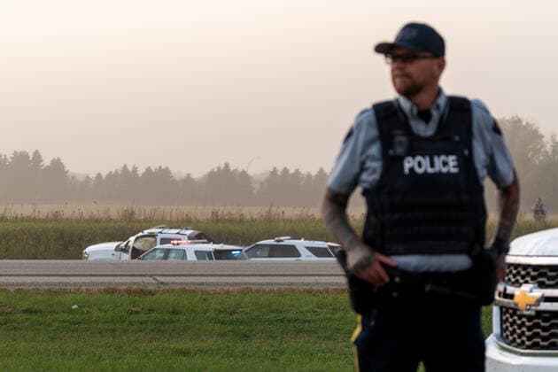 September 7, 2022, Rosthern, SK, Canada: Police and investigators are seen at the side of the road outside Rosthern, Sask., on Wednesday, Sept. 7, 2022. RCMP say Myles Sanderson, a suspect in a deadly stabbing rampage northeast of Saskatoon over the weekend, has been taken into custody near the town of Rosthern on the fourth day of a massive manhunt. Rosthern Canada - ZUMAc35_ 20220907_zaf_c35_136 Copyright: xHeywoodxYux