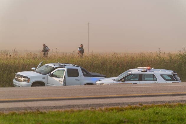 September 7, 2022, Rosthern, SK, Canada: Police and investigators are seen at the side of the road outside Rosthern, Sask., on Wednesday, Sept. 7, 2022. RCMP say Myles Sanderson, a suspect in a deadly stabbing rampage northeast of Saskatoon over the weekend, has been taken into custody near the town of Rosthern on the fourth day of a massive manhunt. Rosthern Canada - ZUMAc35_ 20220907_zaf_c35_137 Copyright: xHeywoodxYux