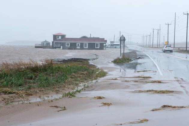 September 24, 2022, Žles-de-la-Madeleine, Que, CANADA: Youth hostel Paradis Bleu is surrounded by high water caused by post-tropical storm Fiona is shown on the Les ÃŽles-de-la-Madeleine, Que., Saturday, Sept. 24, 2022. Coastal flooding remains a threat for parts of Nova Scotia, Prince Edward Island including the Northumberland Strait, the Gulf of St. Lawrence region including Iles-de-la-Madeleine and eastern New Brunswick, southwest Newfoundland, the St. Lawrence Estuary and the Quebec Lower North Shore. Îles-de-la-Madeleine CANADA - ZUMAc35_ 20220924_zaf_c35_064 Copyright: xNigelxQuinnx