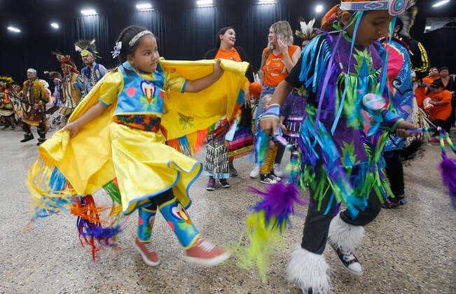 September 30, 2022, WINNIPEG, MANITOBA, CANADA: Hannah Lavallee, 6, and brother Tyee, 8, dance during the grand entrance at the second annual Orange Shirt Day Survivors Walk and Pow Wow on National Day for Truth and Reconciliation in Winnipeg, Friday, September 30, 2022. WINNIPEG CANADA - ZUMAc35_ 20220930_zaf_c35_224 Copyright: xJohnxWoodsx