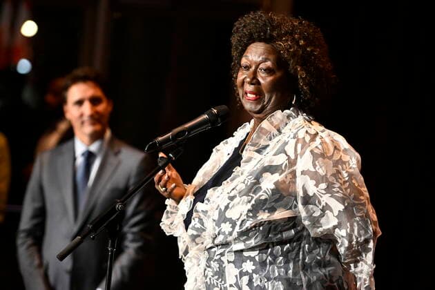 October 5, 2022, Ottawa, ON, CAN: Prime Minister Justin Trudeau listens as Jean Augustine, who became the first Black female Member of Parliament in 1993 and the first Black woman in Cabinet in 2002, speaks after the premiere of Steadfast, a film about Augustine s life, at the National Gallery of Canada in Ottawa, on Wednesday, Oct. 5, 2022. Ottawa CAN - ZUMAc35_ 20221005_zaf_c35_052 Copyright: xJustinxTangx