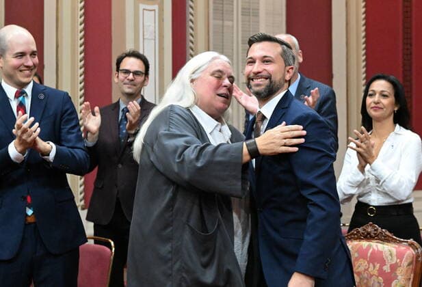 October 19, 2022, QUEBEC, PQ, Canada: Quebec Solidaire Leader Gabriel Nadeau-Dubois, right, gets a hug from co-spokesperson Manon Masse, Wednesday, October 19, 2022 during a ceremony where he swore allegiance to the people of Quebec but refused to swear allegiance to King Charles III, at the Quebec legislature. Members of Quebec Solidaire will not be able to sit at the legislature until a decision from the government is rendered. THE CANADIAN PRESS QUEBEC Canada - ZUMAc35_ 20221019_zaf_c35_069 Copyright: xJacquesxBoissinotx