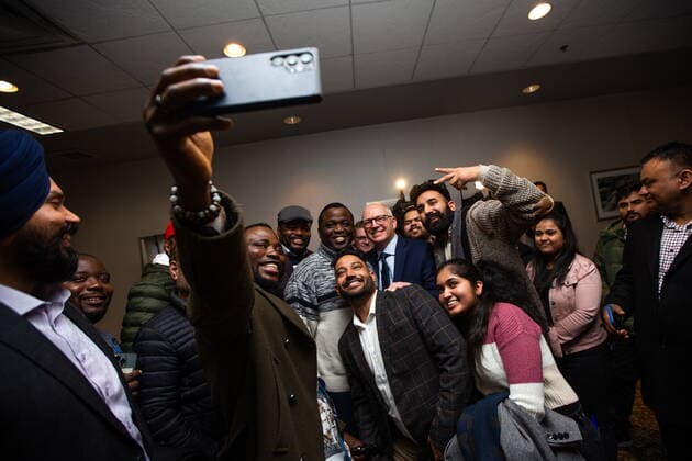 October 26, 2022, Winnipeg, MB, Canada: Ayodele Odeyemi, left, and supporters take a selfie with Scott Gillingham as people celebrate in Winnipeg, on Wednesday, October 26, 2022, following Gillingham™s win in the city™s mayoral election. Winnipeg Canada - ZUMAc35_ 20221026_zaf_c35_165 Copyright: xDanielxCrumpx