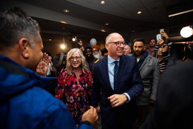 October 26, 2022, Winnipeg, MB, Canada: Scott Gillingham, right, makes an entrance with his wife, Marla Gillingham, as he celebrates with supporters after being declared the next mayor of Winnipeg, on Wednesday, October 26, 2022. Winnipeg Canada - ZUMAc35_ 20221026_zaf_c35_169 Copyright: xDanielxCrumpx