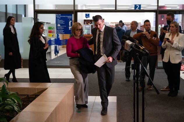 December 5, 2022, Gatineau, PQ, Canada: Maj.-Gen. Dany Fortin, right, arrives with his wife Madeleine Collin ahead of speaking with members of the media following an acquittal in his case at a Gatineau, Que., courthouse on Monday, Dec. 5, 2022. Gatineau Canada - ZUMAc35_ 20221205_zaf_c35_098 Copyright: xSpencerxColbyx