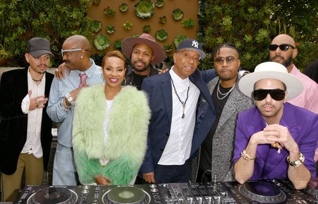 LOS ANGELES, CA -FEBRUARY 03: Evan Ross, Slick Rick, MC Lyte, D-Nice, Russell Simmons, NAS, Swizz Beatz, DJ Cassidy attend A Toast To The Ruler - Grammy Lifetime Achievement Award Powered by Google Pixel on February 03, 2023 at Culina Modern Italian in Los Angeles, California. Copyright: xKoixSojer Snap NxUxPhotos MediaPunchx