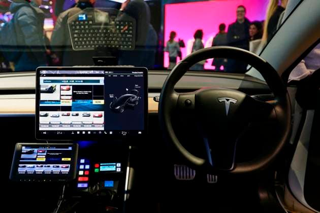 Lucid Motors And Tesla Motors Shows His Newest Technologies In The Mobile World Congress 23 BARCELONA, SPAIN - MARCH 11: The inside of a Tesla Model S, the newest model of the S series of the American multinational automotive and clean energy company, equipped to work as a police car with vehicle registration plate fast reading and detection, exhibited during the Mobile World Congress 2023 on March 11, 2023, in Barcelona, Spain. Barcelona Catalonia Spain Copyright: xJoanxCrosx originalFilename: cros-notitle230310_npYDX