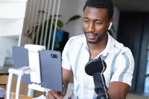 Happy african american man sitting at table in kitchen, using tablet and making vlog Happy african american man sitting at table in kitchen, using tablet and making vlog. Spending quality time at home alone., model released, , property released, Cape Town, South Africa, 2022-09-14T22:00:00.000Z, 3847029.jpg, people,happy,african american,man,sitting,table,kitchen,using tablet,making,vlog,spending,quality time,home,alone,young,lifestyle,person,indoors,room,house,adult,cooking,smile,smiling,interior,food,cheerful,portrait,cute,fun,wooden,happiness,attractive,african,american,using,tablet,quality,time Young Adult,Man,Male,Black