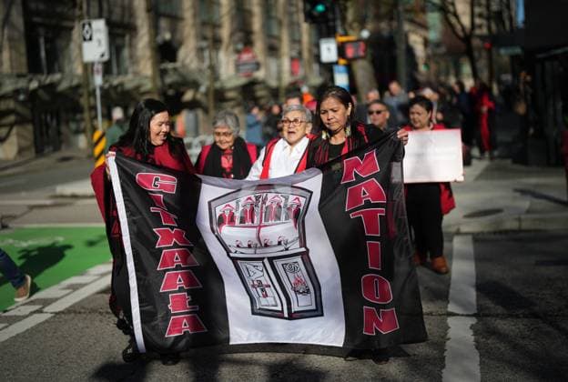 April 3, 2023, VANCOUVER, BC, CANADA: Members of the Gitxaala Nation, including Chief Councillor Linda Innes, front right, march to B.C. Supreme Court in Vancouver, B.C., Monday, April 3, 2023. The British Columbia First Nation challenging the province over an online registry it uses to automatically grant mineral rights is very hopeful the B.C. Supreme Court will side with it following a two-week hearing in Vancouver, its chief councillor says. VANCOUVER CANADA - ZUMAc35_ 20230403_zaf_c35_065 Copyright: xDarrylxDyckx