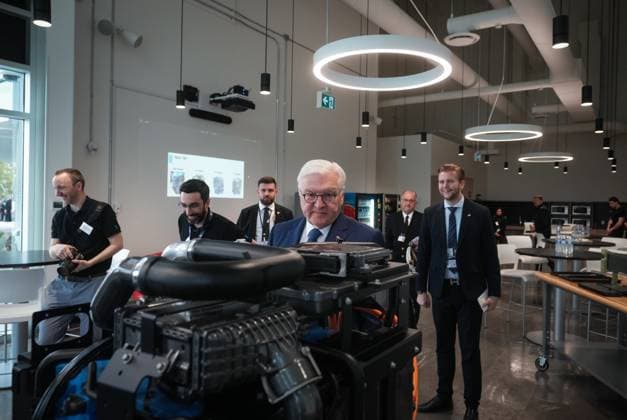 April 25, 2023, BURNABY, BC, CANADA: Germany President Frank-Walter Steinmeier, front centre, views a fuel cell system prototype during a tour of fuel cell stack manufacturer, Cellcentric Canada, in Burnaby, B.C., Tuesday, April 25, 2023. BURNABY CANADA - ZUMAc35_ 20230425_zaf_c35_060 Copyright: xDarrylxDyckx