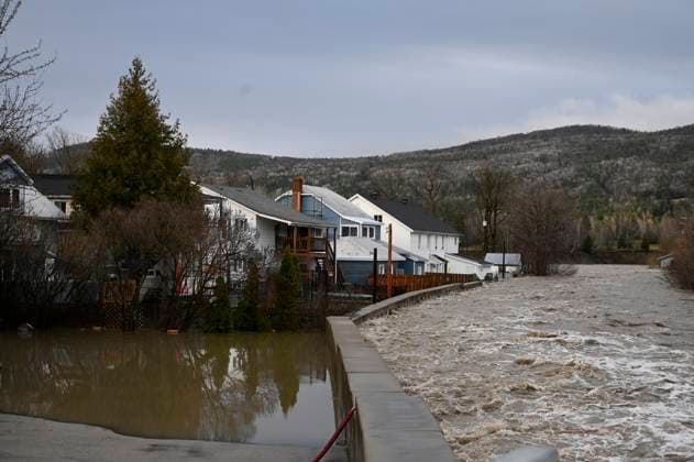 May 1, 2023, BAIE SAINT-PAUL, PQ, CANADA: Houses are flooded near the Bras-du-Nord river Monday, May 1, 2023 in downtown Baie-Saint-Paul, Quebec. In Baie-St-Paul, Que., around 90 kilometres northeast of the provincial capital, the mayor declared a state of emergency due to heavy rains that washed away roads and isolated homes. BAIE SAINT-PAUL CANADA - ZUMAc35_ 20230501_zaf_c35_098 Copyright: xJacquesxBoissinotx