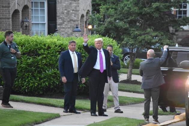 May 25, 2023, Sterling, Virginia, United States: Former President of the United States Donald J. Trump waves to of UNF News prior to getting in his suburban. After 7:30 PM Eastern Time, Thursday evening, Former U.S. President Donald J. Trump departed a rest overnight en route Trump National Golf Club Washington DC in Virginia for a dinner with Boris Johnson at the golf club. Boris Johnson served as Prime Minister of the United Kingdom and Leader of the Conservative Party from 2019 to 2022. Sterling United States - ZUMAs197 20230525_zaa_s197_229 Copyright: xKylexMazzax