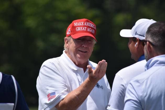 May 27, 2023, Sterling, Virginia, United States: Former President of the United States Donald J. Trump visits the driving range and speaks with fans. Former President of the United States Donald J. Trump visits the driving range, meets fans and watches LIV Golf Washington DC 2023 Round 2 at Trump National Golf Club Washington DC in Sterling, Virginia, United States. Sterling United States - ZUMAs197 20230527_zaa_s197_134 Copyright: xKylexMazzax