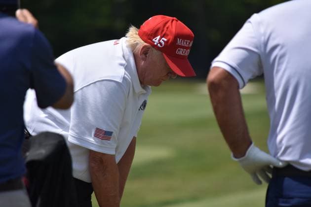 May 27, 2023, Sterling, Virginia, United States: Former President of the United States Donald J. Trump swings his put and golfs at the driving range. Former President of the United States Donald J. Trump visits the driving range, meets fans and watches LIV Golf Washington DC 2023 Round 2 at Trump National Golf Club Washington DC in Sterling, Virginia, United States. Sterling United States - ZUMAs197 20230527_zaa_s197_131 Copyright: xKylexMazzax