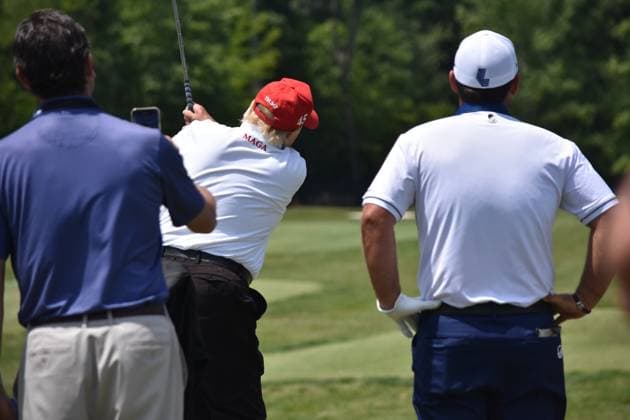 May 27, 2023, Sterling, Virginia, United States: Former President of the United States Donald J. Trump swings his put and golfs at the driving range. Former President of the United States Donald J. Trump visits the driving range, meets fans and watches LIV Golf Washington DC 2023 Round 2 at Trump National Golf Club Washington DC in Sterling, Virginia, United States. Sterling United States - ZUMAs197 20230527_zaa_s197_133 Copyright: xKylexMazzax