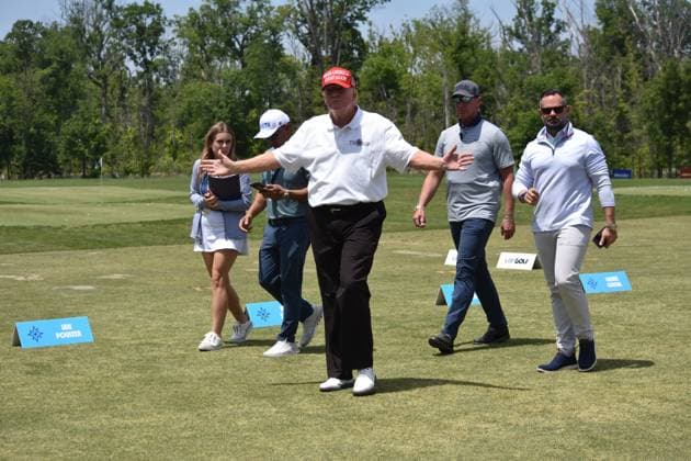 May 27, 2023, Sterling, Virginia, United States: Former President of the United States Donald J. Trump walks by fans and talks with them. Former President of the United States Donald J. Trump visits the driving range, meets fans and watches LIV Golf Washington DC 2023 Round 2 at Trump National Golf Club Washington DC in Sterling, Virginia, United States. Sterling United States - ZUMAs197 20230527_zaa_s197_144 Copyright: xKylexMazzax