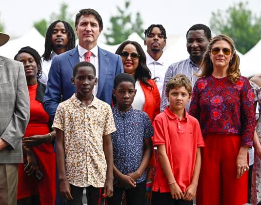 July 1, 2023, Ottawa, ON, CAN: Prime Minister Justin Trudeau stands with Alrick, 11, front left, and Anael Tsoala, 9, who will become Canadian Citizens during a ceremony during the Canada Day noon show, in Ottawa, on Saturday, July 1, 2023. Ottawa CAN - ZUMAc35_ 20230701_zaf_c35_057 Copyright: xJustinxTangx