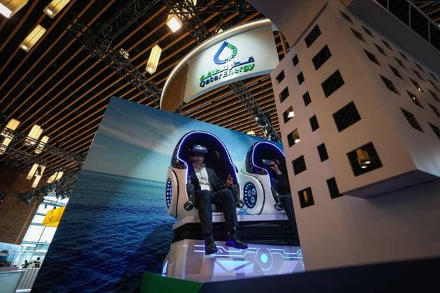 July 10, 2023, VANCOUVER, BC, CANADA: Delegate Dae Ho Son, of Hanwha Ocean, navigates a virtual reality LNG ship at the Qatar Energy booth during the LNG2023 conference, in Vancouver, B.C., Monday, July 10, 2023. VANCOUVER CANADA - ZUMAc35_ 20230710_zaf_c35_133 Copyright: xDarrylxDyckx
