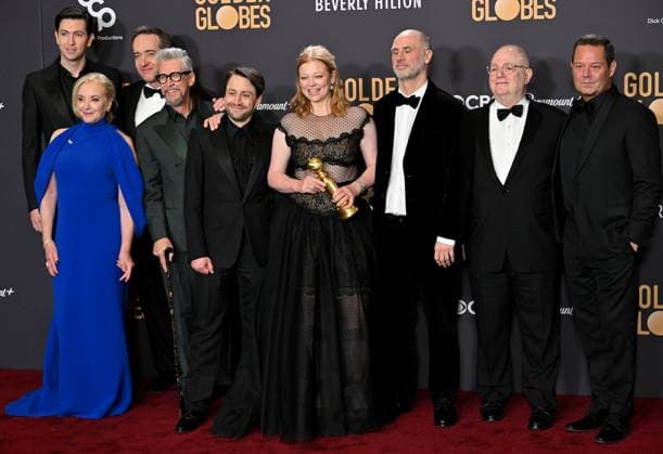 (L-R) Nicholas Braun, J. Smith-Cameron, Matthew Macfadyen, Alan Ruck, Kieran Culkin, Sarah Snook, Jesse Armstrong, Frank Rich, and Mark Mylod, winners of the Best Television Series - Drama for Succession, during the 81st annual Golden Globe Awards at the Beverly Hilton in Beverly Hills, California on Sunday, January 7, 2024. LAP202401070366 CHRISxCHEW