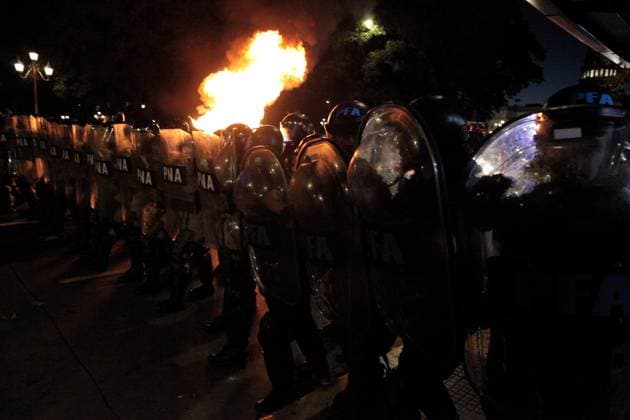 February 2, 2024, Buenos Aires, Federal Capital, Argentina: February 2, 2024, Buenos Aires, Argentina: The security agencies of the Argentine state strongly repressed demonstrators who were protesting in the vicinity of the nation s Congress in repudiation of the approval, in the chamber of deputies, of the controversial Omnibus Law of the newly elected president, Javier Milei. In the repression, older adults were beaten, run over, and sprayed with pepper spray. They also strongly detained a photographer. Buenos Aires Argentina - ZUMAa179 20240202_aap_a179_012 Copyright: xRobertoxAlmeidaxAveledox