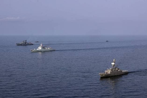 Golf von Oman, Marine-Manöver von China, Russland und Iran March 13, 2024, Undefined, Iran: Iranian, Russian, and Chinese warships conducted the â€oePhoto Ex†exercise and offensive formations in Iran s territorial waters during a joint military drill in southern Iran. The new warships of the Islamic Revolution Guards Corps (IRGC) have participated in a joint naval drill in the Indian Ocean. Naval forces from Iran, Russia, and China have jointly launched the ongoing drill, known as â€oeMarine Security Belt 2024â€Â. Martyr Mahmoudi warship, Martyr Soleimani combat patrol vessel, Martyr Abu Mahdi al-Muhandis warship, Martyr Tavvasoli frigate, and IRGC Navy helicopters are present in the exercise. Undefined Iran - ZUMAi98_ 20240313_zih_i98_008 Copyright: xIranianxArmyxOfficex