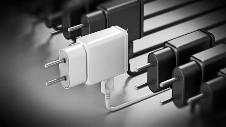 Fast white mobile device charger stands out among standard black charge devices. 3D illustration Fast white mobile device charger stands out among standard black charge devices. 3D illustration. Copyright: xZoonar.com CigdemxSimsekx 21276543