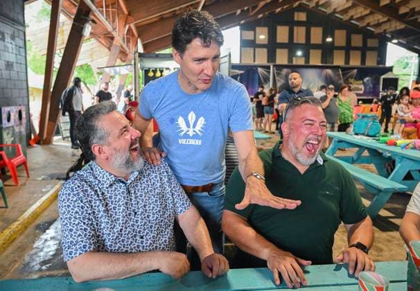 June 23, 2024, Chateauguay, Pq, Canada: Prime Minister Justin Trudeau, centre, talks with people as he visits a poutine festival in Chateauguay, Que., Sunday, June 23, 2024. Chateauguay Canada - ZUMAc35_ 20240623_zaf_c35_006 Copyright: xGrahamxHughesx