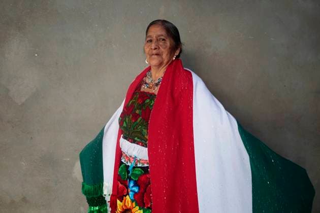 Mexicans And Tourists Get Ready For The Grito De Independencia Of Mexico This September 15 Feliciana Hernandez Bautista, a designer from the indigenous community of Ahuiran, Paracho, Michoacan, in Mexico City, Mexico, on September 14, 2024, uses items from the region prior to the Grito de Independencia de Mexico that takes place on September 15 in the Zocalo of the capital, headed by the president of Mexico, Andres Manuel Lopez Obrador. Mexico City Mexico City Mexico Copyright: xGerardoxVieyrax originalFilename: vieyra-notitle240914_np58Z.jpg