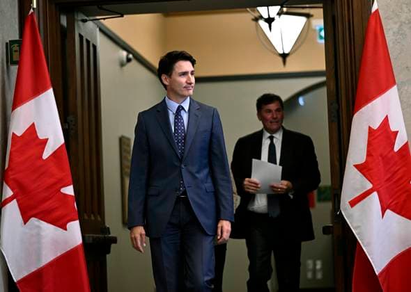 October 14, 2024, Ottawa, On, CAN: Prime Minister Justin Trudeau, Minister of Public Safety, Democratic Institutions and Intergovernmental Affairs Dominic LeBlanc, right, and Minister of Foreign Affairs Melanie Joly, obscured, make their way to a news conference on the investigative efforts related to violent criminal activity occurring in Canada with connections to India, on Parliament Hill in Ottawa, on Monday, Oct. 14, 2024. Ottawa CAN - ZUMAc35_ 20241014_zaf_c35_041 Copyright: xJustinxTangx