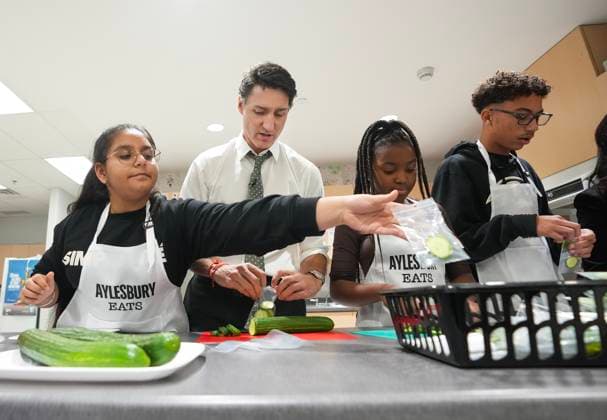 November 22, 2024, Brampton, On, CANADA: Prime Minister Justin Trudeau, centre, helps pack lunches as part of the school food program as he visits Aylesbury Public School in Brampton, Ont., on Friday, November 22, 2024. Brampton CANADA - ZUMAc35_ 20241122_zaf_c35_025 Copyright: xNathanxDenettex
