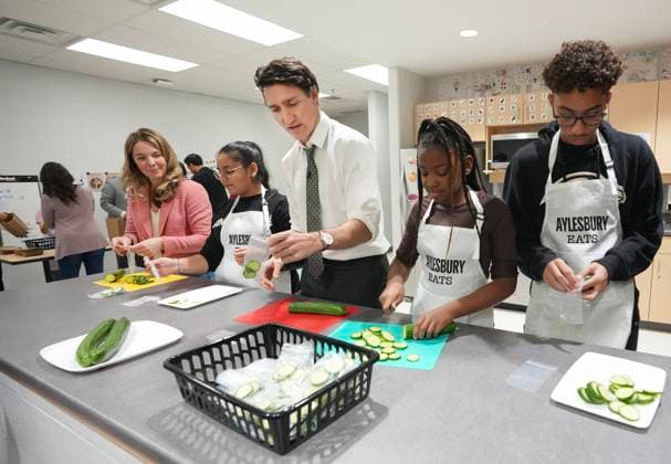 November 22, 2024, Brampton, On, CANADA: Prime Minister Justin Trudeau, centre, helps pack lunches as part of the school food program as he visits Aylesbury Public School in Brampton, Ont., on Friday, November 22, 2024. Brampton CANADA - ZUMAc35_ 20241122_zaf_c35_028 Copyright: xNathanxDenettex