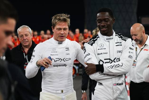 December 5, 2024, Abu Dhabi, United Arab Emirates: Brad Pitt, actor playing Sonny Hayes, and Damson Idris, actor playing Joshua Pearce, both drivers of the fictionala Apex APXGP F1 team in the upcoming F1 movie directed by Joseph Kosinski, are seen ahead of Formula 1 Abu Dhabi Grand Prix at Yas Marina Circuit on December 5th, 2024 in Abu Dhabi, United Arab Emirates. Abu Dhabi United Arab Emirates - ZUMAz156 20241205_zip_z156_050 Copyright: xBeataxZawrzelx