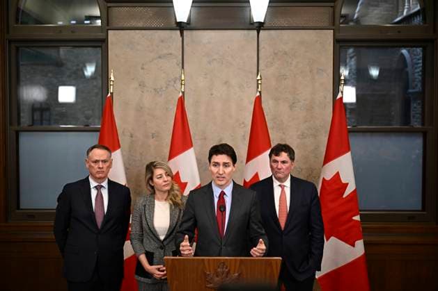 February 1, 2025, Ottawa, On, CANADA: Prime Minister Justin Trudeau addresses media following the imposition of a raft of tariffs by U.S. President Donald Trump against Canada, Mexico and China, in Ottawa, Saturday, Feb. 1, 2025. Minister of Public Safety David McGuinty, left to right, Global Affairs Minister Melanie Joly and Minister of Governmental Affairs Dominic LeBlanc look on. Ottawa CANADA - ZUMAc35_ 20250201_zaf_c35_131 Copyright: xJustinxTangx
