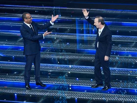 : Sanremo, 75th Italian Song Festival 2025 - Fourth Evening. In the photo Carlo Conti and Roberto Benigni - ZUMAp169 20250214_zea_p169_1088 Copyright: xMaurizioxD Avanzox