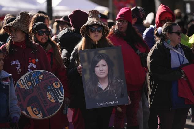 February 14, 2025, Vancouver, Bc, CANADA: A woman carries a photograph of Brandy Vittrekwa, 17, whose body was found in Whitehorse in 2014, during the annual Women s Memorial March, in Vancouver, on Friday, February 14, 2025. The march is held to honour missing and murdered Indigenous women and girls from the community with stops along the way to commemorate where women were last seen or found. Vancouver CANADA - ZUMAc35_ 20250214_zaf_c35_113 Copyright: xDarrylxDyckx